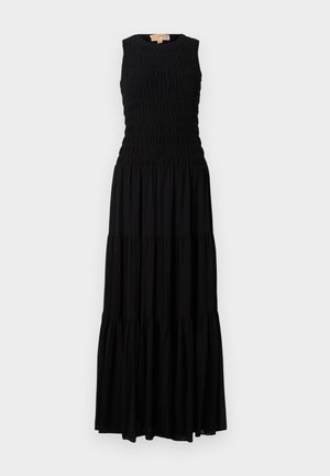 Svart maxikjole med ermeløs design, som har smocket bodice og lagdelt skjørt. Glatt tekstur, uformell stil og ensfarget.