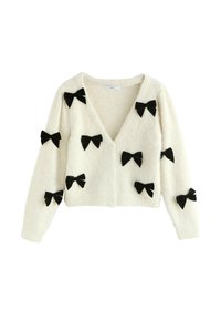 Weißer Cardigan aus weichem Material, mit V-Ausschnitt, langen Ärmeln und mehreren schwarzen Samtbows, die gleichmäßig auf der Vorderseite verteilt sind.