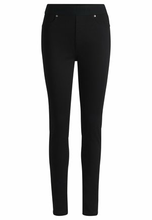 Schwarze Skinny-Jeans mit glatter Textur, ausgestattet mit einem hohen Bund, metallischen Knopf-Akzenten und gestickten Details an den Vorder-Taschen.