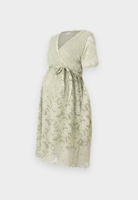 Vaalean vihreä pitsinen äitiyspuku, jossa on kietaisumallinen muotoilu, lyhyet hihat, solmittava vyötärö ja kukkakuviot, sisältä sileä vuori.