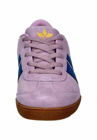 Lilac suede sneaker with blue stripes, featuring a textured finish, round toe, and a gum sole. Gold logo accent on the tongue.