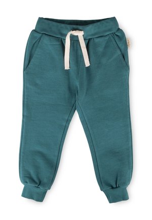 Pantaloni della tuta per bambini verde petrolio con vita elasticizzata, coulisse bianca, tasche laterali e polsini alle caviglie.
