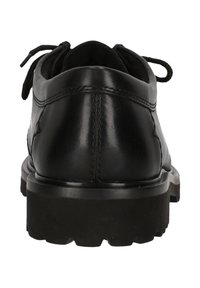 Scarpa nera in pelle con punta arrotondata, chiusura con lacci e suola in gomma spessa e texturizzata. Presenta cuciture lungo i lati e sul retro.