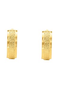Gold hoop earrings with a textured glitter finish, featuring a smooth edge and a slight ridge on either side for visual contrast.