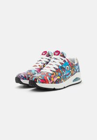 Colorful sneakers with a mix of graphic patterns, predominantly pink, blue, and yellow, featuring white laces and a black rubber sole.