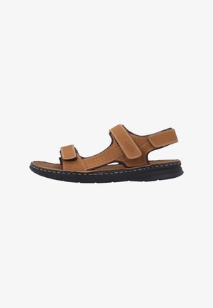 Brun læder sandal med åben tå med justerbare velcro-stropper og en sort polstret sål for komfort og støtte.