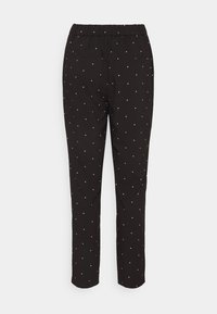 Pantalon noir uni avec motifs à pois blancs, taille élastique et poches latérales. Coupe droite.
