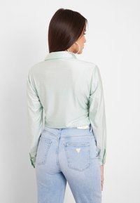Guess ALLOVER-STRASS - Cămașă - verde acqua