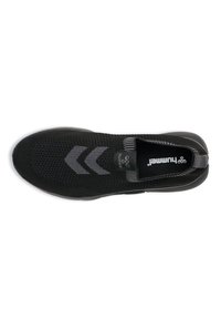 Black mesh slip-on shoe with grey chevron accents, textured surface, elastic collar, and a black insole featuring the brand logo.