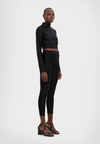 Just Cavalli SKINNY FOUSEUX - Leggingek - Nadrágok - black