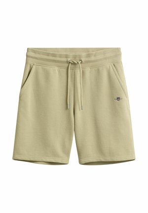 Pantalones cortos de algodón color beige hasta la rodilla con cintura acanalada, cordón ajustable, bolsillos laterales y pequeño logotipo bordado en la pierna derecha.