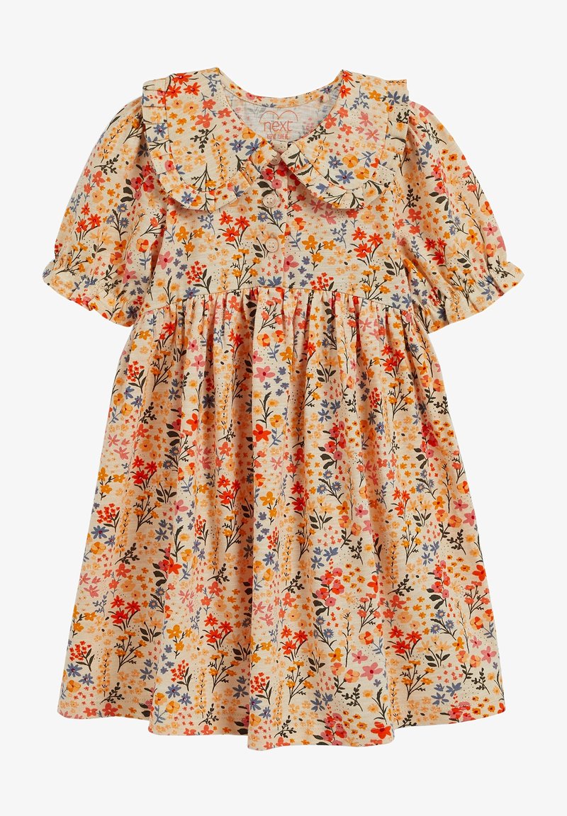 Robe pour tout-petit avec manches ballon, col à volants, boutons devant, et imprimé floral multicolore sur tissu beige clair.