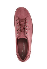 Pink suede sneaker with rounded toe, metal eyelets, and flat laces. Features a cushioned insole and subtle logo detail on the side.