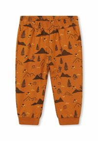 Pantalons en coton orange avec un motif naturel brun représentant des montagnes, des arbres, des animaux et des champignons. Taille élastique et ourlets à revers.