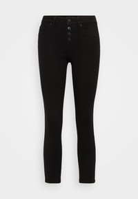 Jeans skinny negros de cintura alta con cierre frontal de cinco botones, dos bolsillos delanteros y una textura de tela suave y elegante.