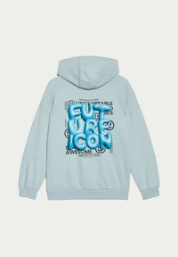 Felpa leggera azzurra con tasca a marsupio frontale, vestibilità oversize e design grafico con la scritta "FUTURE ICON" in grassetto blu con dettagli neri.