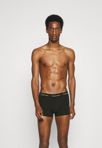 Calvin Klein Underwear LOW RISE TRUNK STRETCH 3 PACK - Cuecas boxer - hemispere blue/black
