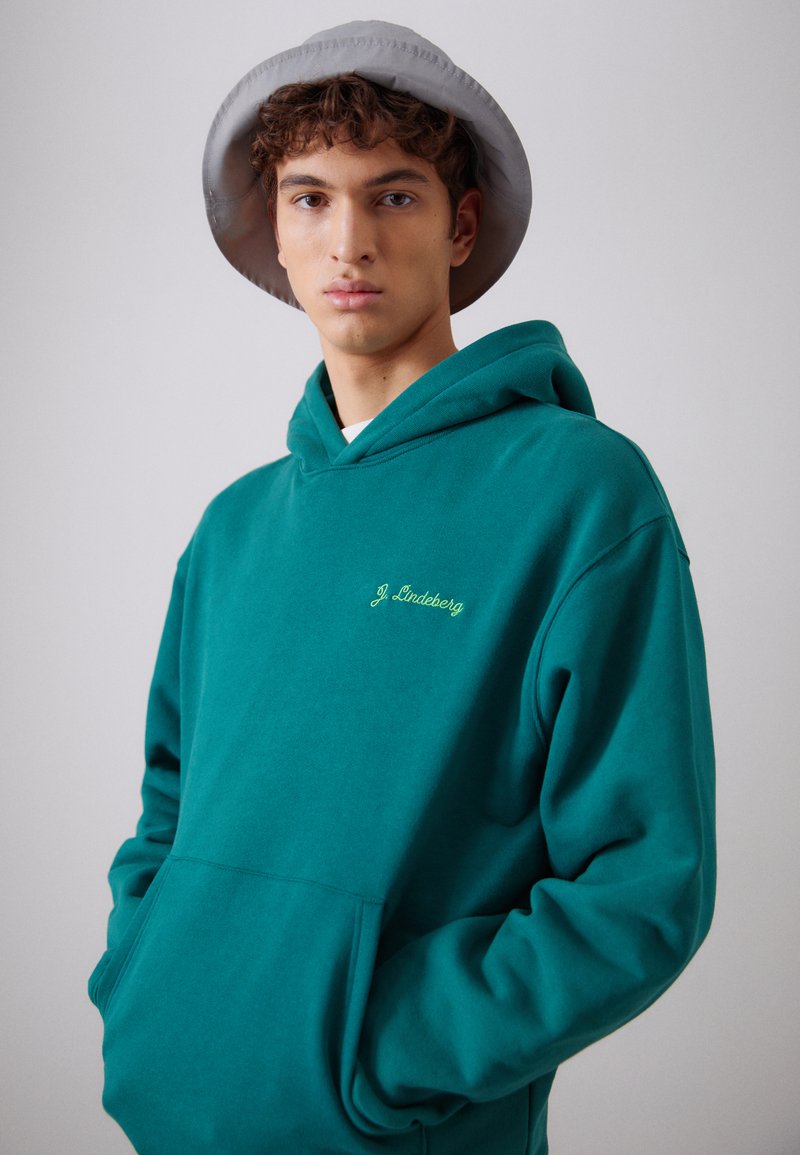J.LINDEBERG KARSON GRAPHIC HOODIE Sweatshirt rain forest/evergreen