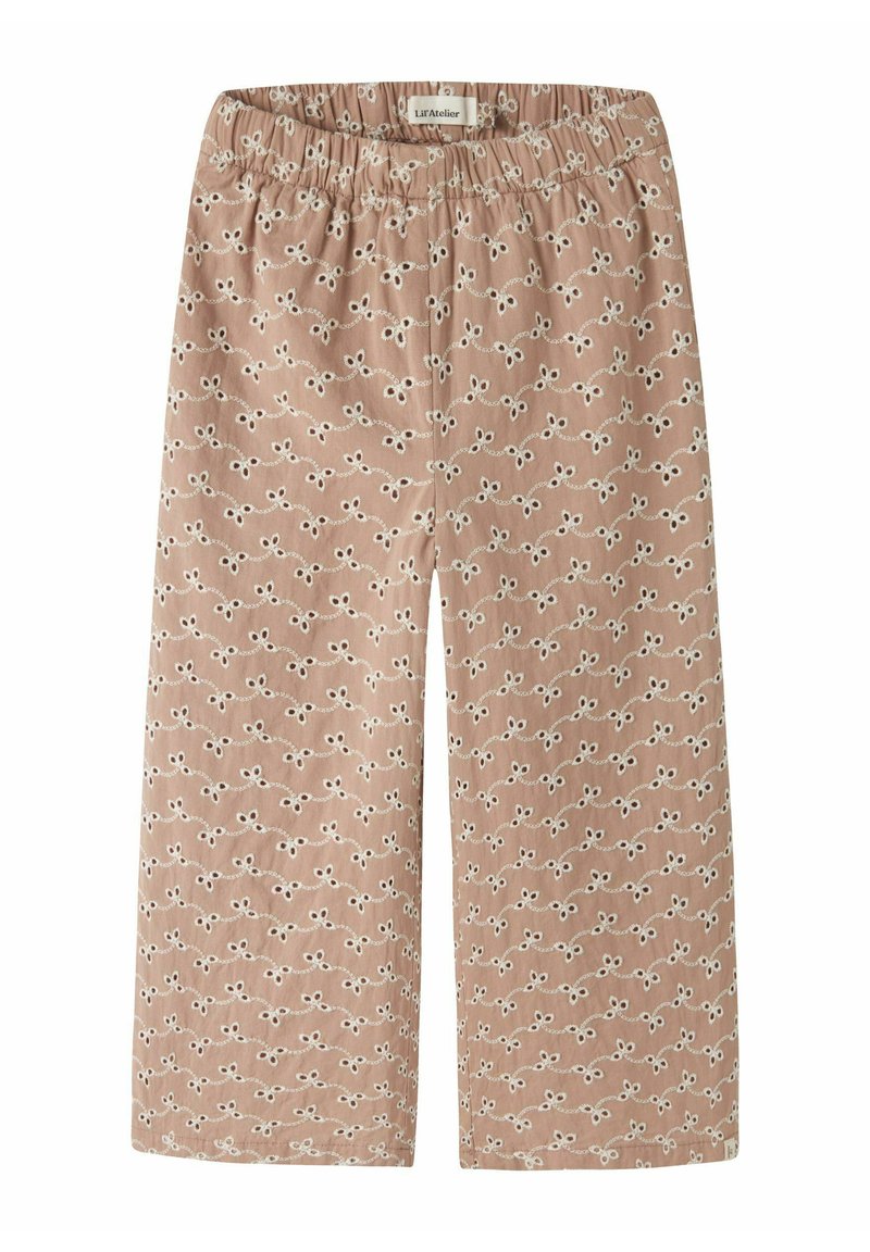 Bikses no mīksta rozā auduma ar baltu cilpu un punktu rakstu, ar elastīgu jostasvietu un plašu kājas dizainu.