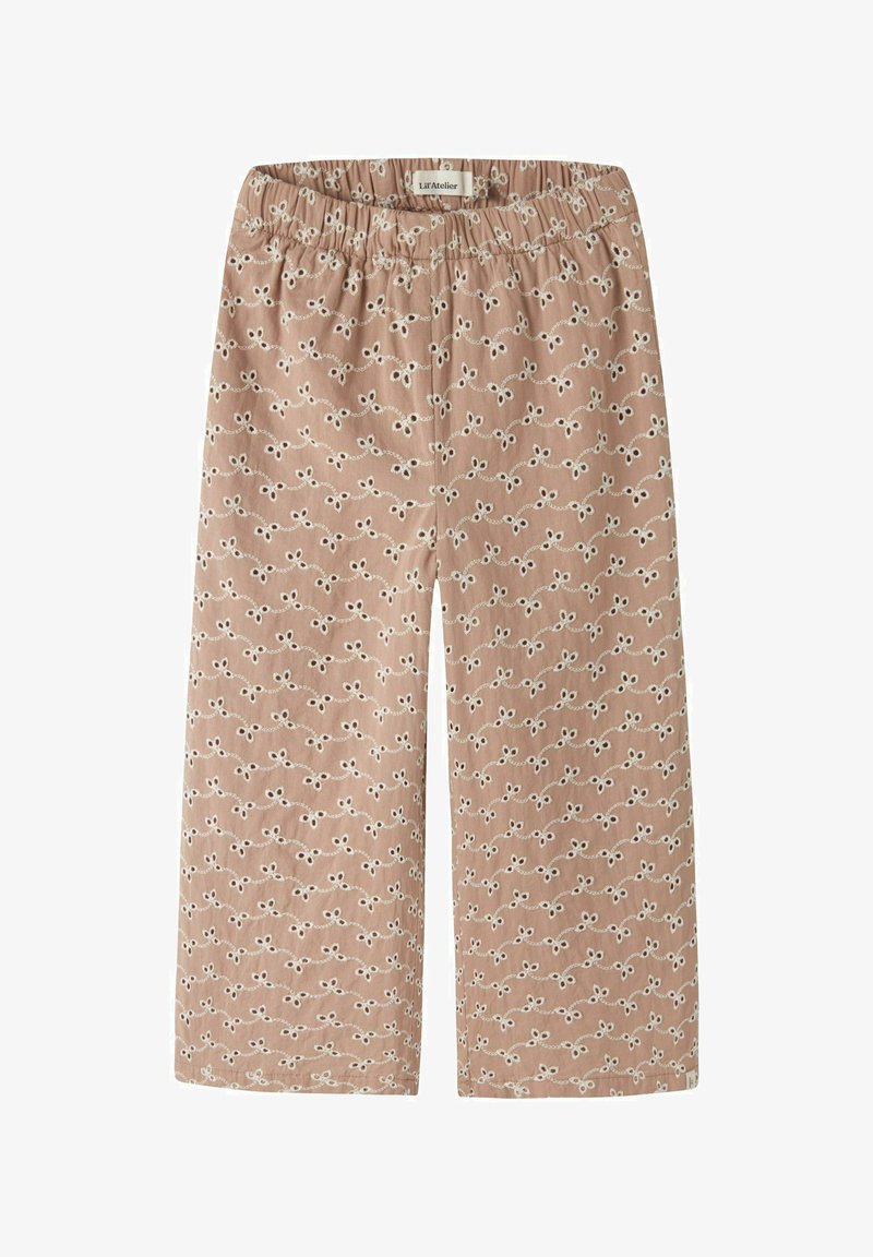 Bikses no mīksta rozā auduma ar baltu cilpu un punktu rakstu, ar elastīgu jostasvietu un plašu kājas dizainu.