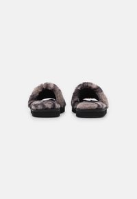 Fluffy gray slide slippers with an open toe and backless design; soft texture and contrasting black sole. Suitable for indoor use.