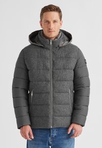 Graue Puffjacke mit einer strukturierten, wollähnlichen Oberseite und glatten Ärmeln, ausgestattet mit einem Reißverschluss und Seitentaschen. Mit Kapuze.