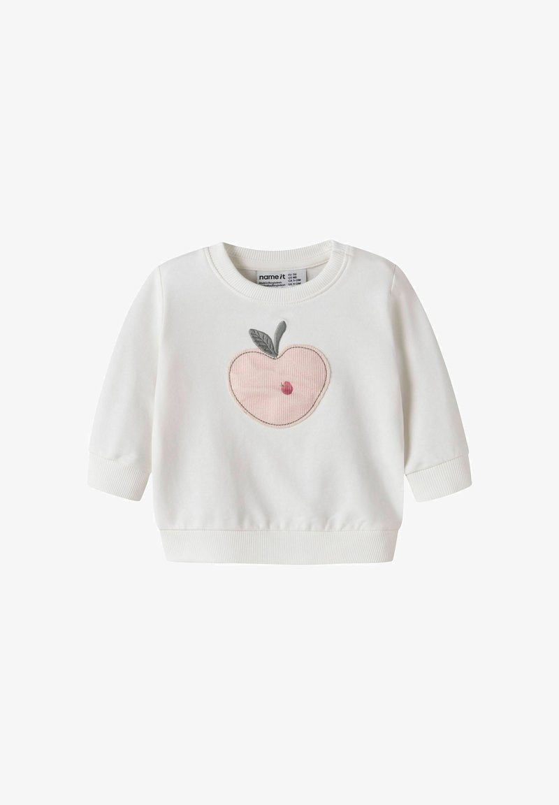 Balts bērnu džemperis ar garām piedurknēm un priekšpusē rozā izšūtu ābolu ar pelēku lapas dizainu.