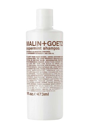 Malin + Goetz Pfefferminz-Shampoo-Flasche, weiß mit braunem Text, 473 ml, listet Inhaltsstoffe und Gebrauchsanweisungen auf dem Etikett auf.