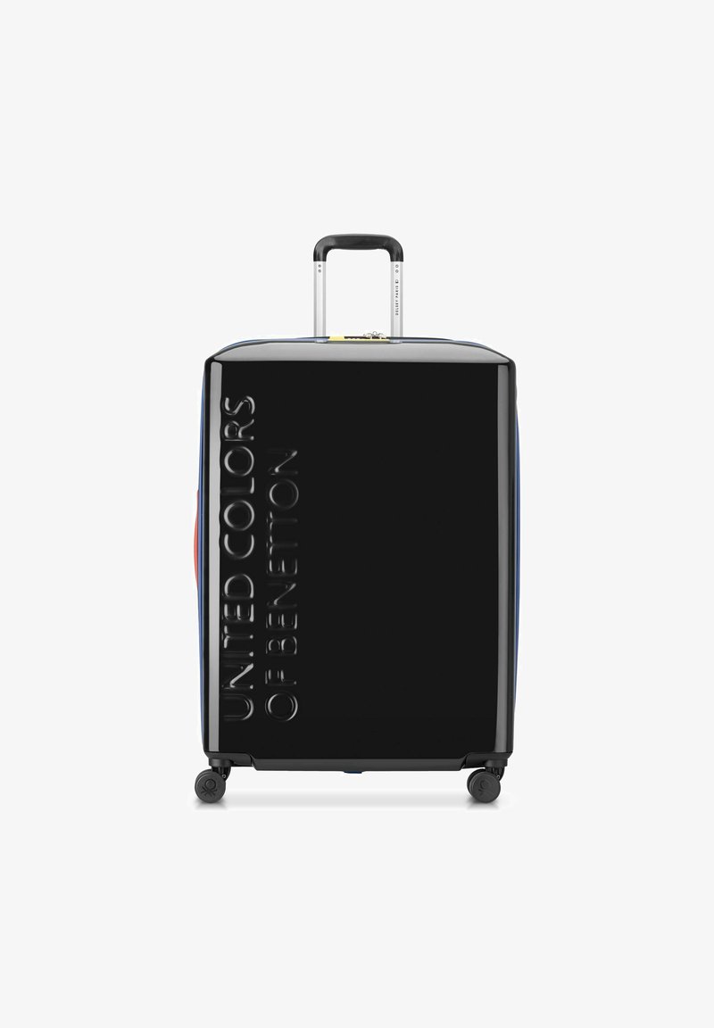 Valigia rigida nera con finitura lucida. Caratterizzata da un manico telescopico, quattro ruote e testo del logo impresso. Dettagli blu e rossi.