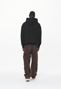 Pegador LOGO OVERSIZED  - Sweatshirt com capuz - black