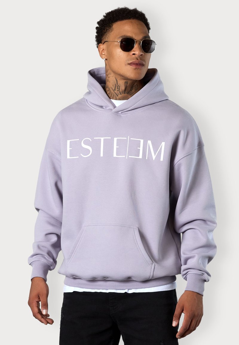 Lavender hoodie made of soft fabric, featuring a front kangaroo pocket, ribbed cuffs, and bold "ESTEEM" print in white.