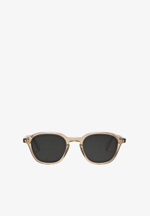 Square-frame sunglasses with a light beige plastic frame and dark gray lenses. Features a polished finish and subtle hardware accents.