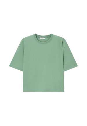 T-shirt court uni vert mousse à manches courtes avec un col rond sur fond blanc.