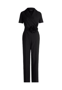 Czarny kombinezon z krótkimi rękawami, zrywaną konstrukcją i kwiatowym detalem z tkaniny w talii. Prosty krój nogawek i dopasowany krój. Gładka tekstura.