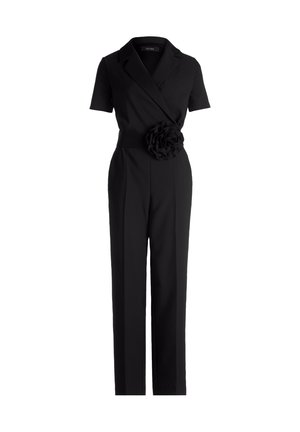 Sort jumpsuit med korte ærmer, omslagsdesign og en stoffblomstdetalje i taljen. Lige ben og tætsiddende pasform. Glat tekstur.