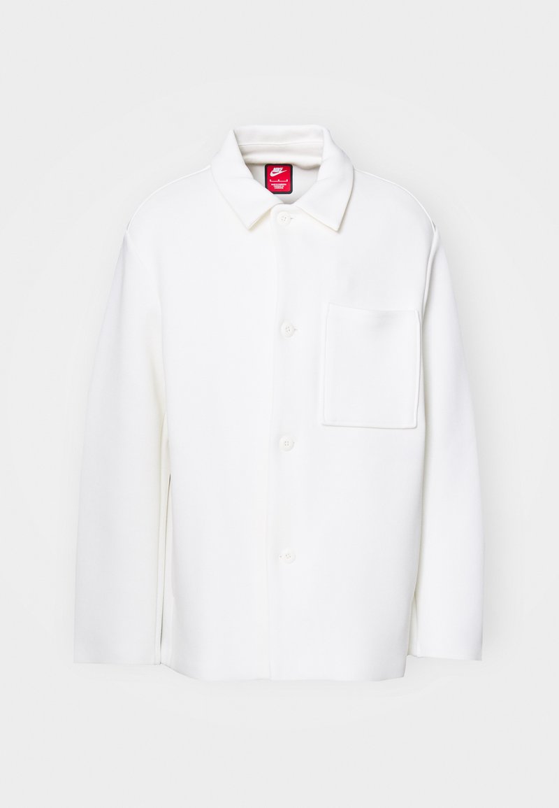 Nike Sportswear Lichte jas crème Nike Sportswear Lichte jas crème