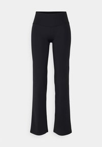 Leggings évasés noirs avec une taille haute, fabriqués en tissu extensible. Design sans coutures avec une texture lisse et sans ornements visibles.