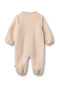 Rompers en polaire beige clair à manches longues et poignets élastiques, avec un col rond et une ouverture en bas pour un enfilage facile.