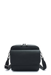 Black leather crossbody bag with a textured finish, zippered top closure, adjustable strap, and subtle branding on the front.