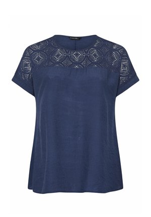 Top de mujer azul marino de manga corta con canesú de encaje con patrones circulares y de diamante, escote redondo y corte holgado.