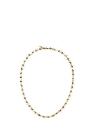 Collier en chaîne d'or délicat avec des maillons alternant petits anneaux et formes en croix, sécurisé par un fermoir mousqueton.