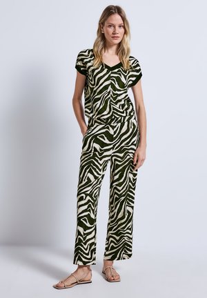 GEMUSTERTER - Jumpsuit - grün