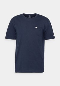 T-shirt in cotone blu navy con maniche corte, colletto rotondo e un piccolo logo bianco sul petto. Texture liscia, senza motivi o dettagli visibili.