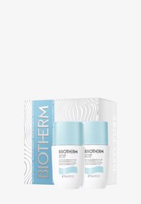 Set de déodorants Biotherm Deo Pure en roll-on, comprenant deux bouteilles de 75 ml avec des corps blancs et des bouchons bleu clair, présentées dans une boîte à motif.
