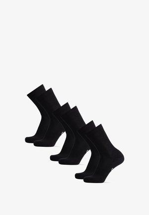 Schwarze Baumwollsocken im Fünferpack. Mit einem gerippten Design, Knöchellänge, glatter Textur und verstärkten Zehen- und Fersenbereichen.