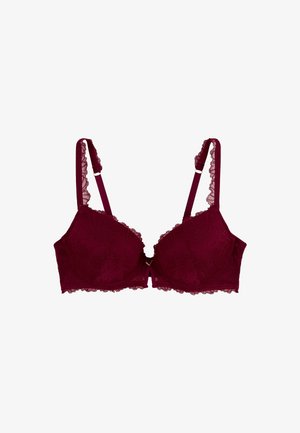 Soutien-gorge en dentelle bourgogne avec des coques rembourrées, motif floral, bretelles réglables et bords festonnés. Comprend un petit détail décoratif à l'avant.