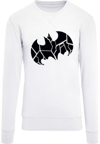 Hvid sweatshirt med et stort sort abstrakt Batman-logo design, med en revnet tekstur og ribbede manchetter og kant.
