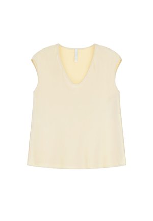 Top senza maniche color crema con scollatura a V, realizzato in tessuto morbido e dalla vestibilità rilassata, adatto per un abbigliamento informale.