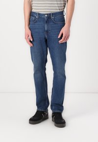 Tommy Hilfiger REGULAR MERCER - Egyenes szárú farmer - blue denim