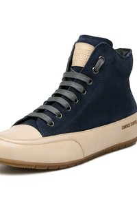 High-top sneakers featuring navy suede upper, beige leather toe cap, gray laces, and branded patch on the tongue. Rubber sole with textured grip.